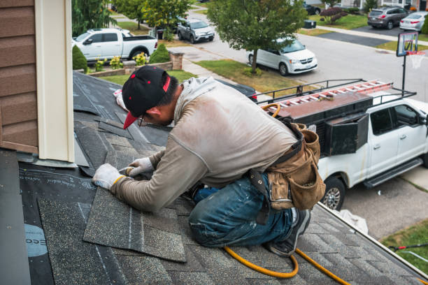 Professional Emergency Roof Repair technician working in Reading, VT